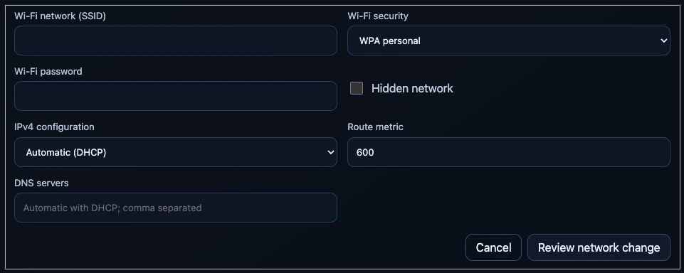 Wi-Fi configuration draft with empty SSID and password fields, WPA personal, hidden network, DHCP and route metric.